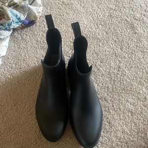 Black rain boots